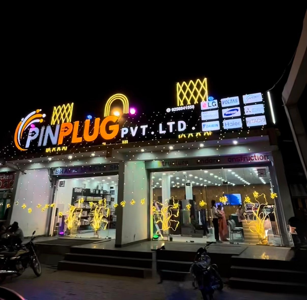 Pinplug Private Limited Storefront in Jaipur at night